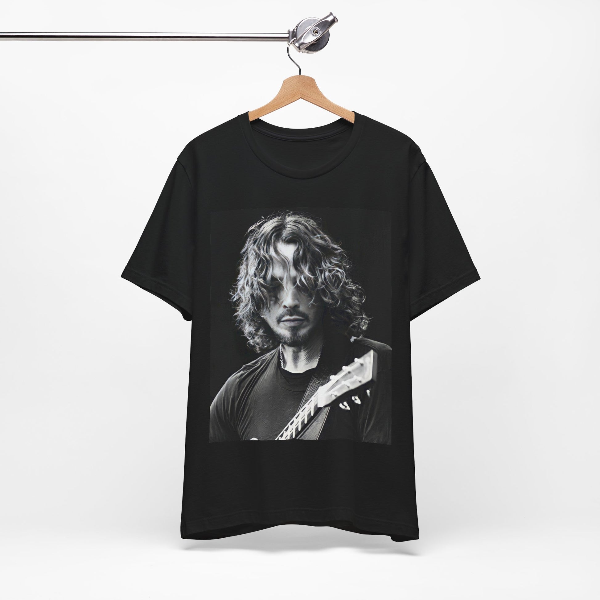 A black graphic t-shirt featuring a graphic of Chris Cornell performing live on tour in the 1990s.