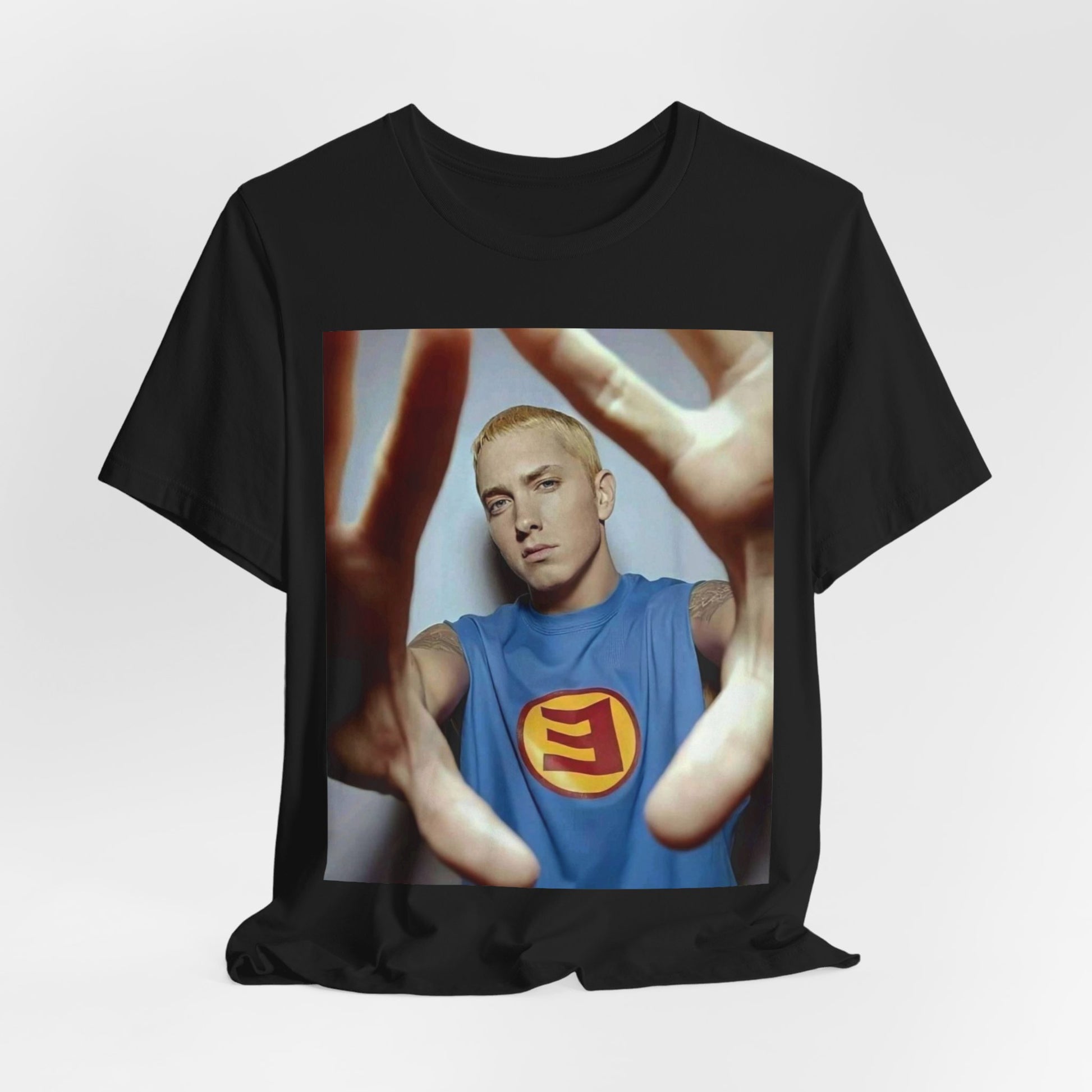 A black graphic t-shirt featuring a graphic related to Eminem's 'The Slim Shady LP' album.