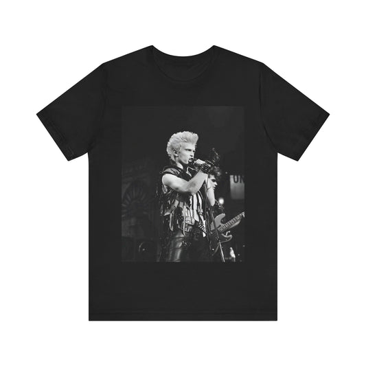 A black graphic t-shirt featuring a relaxed or candid graphic of Billy Idol, possibly on stage or in a merch style.