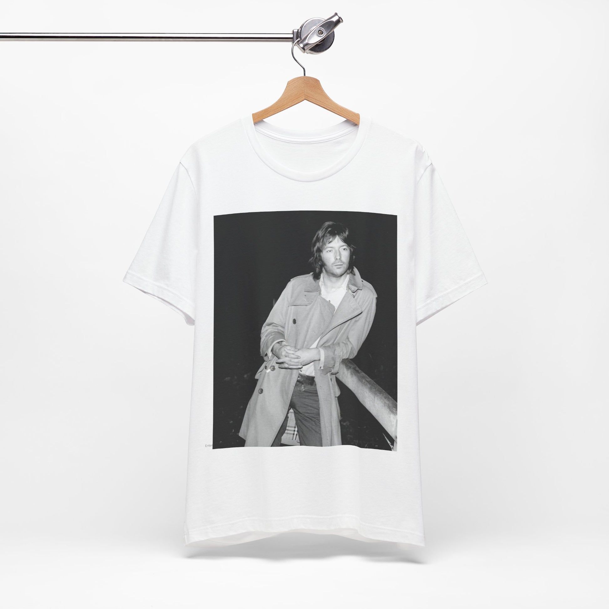 A black graphic t-shirt featuring a retro graphic of Eric Clapton as a blues master.