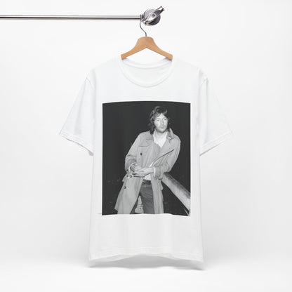 A black graphic t-shirt featuring a retro graphic of Eric Clapton as a blues master.