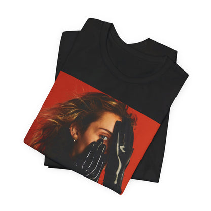 A black graphic t-shirt featuring a graphic of Miley Cyrus with Nashville or country music elements.
