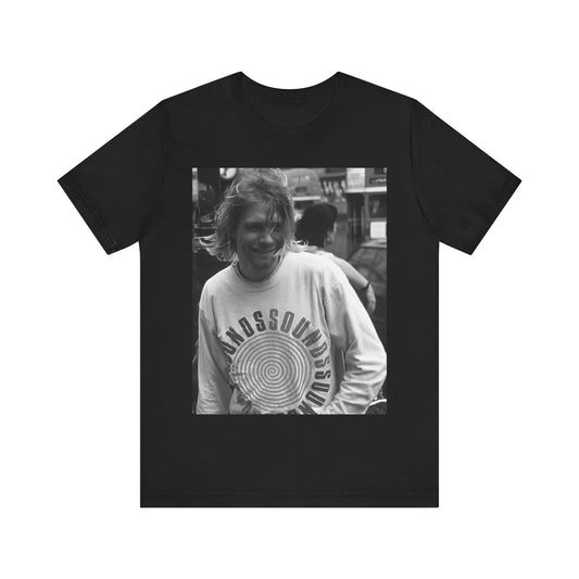 A black graphic t-shirt featuring a vintage rock legends graphic of Nirvana.