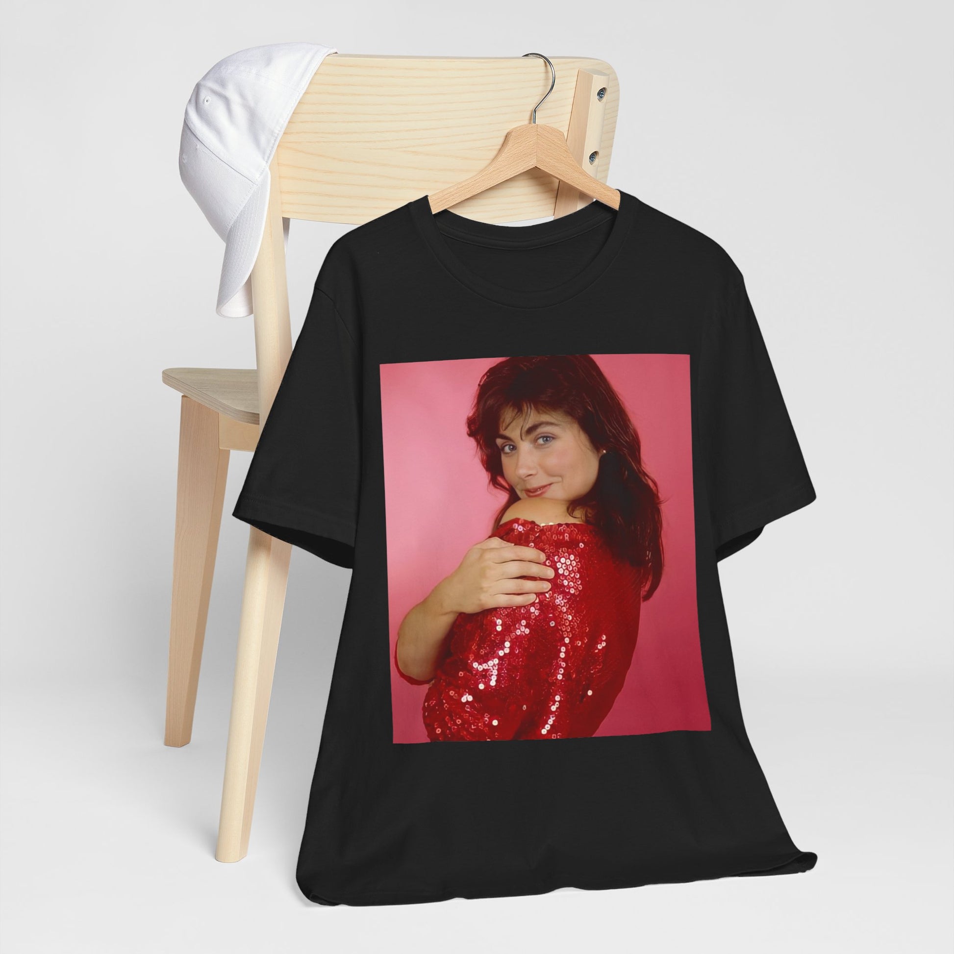 A black graphic t-shirt featuring a vintage graphic related to Laura Branigan's 'Self Control' song or era.