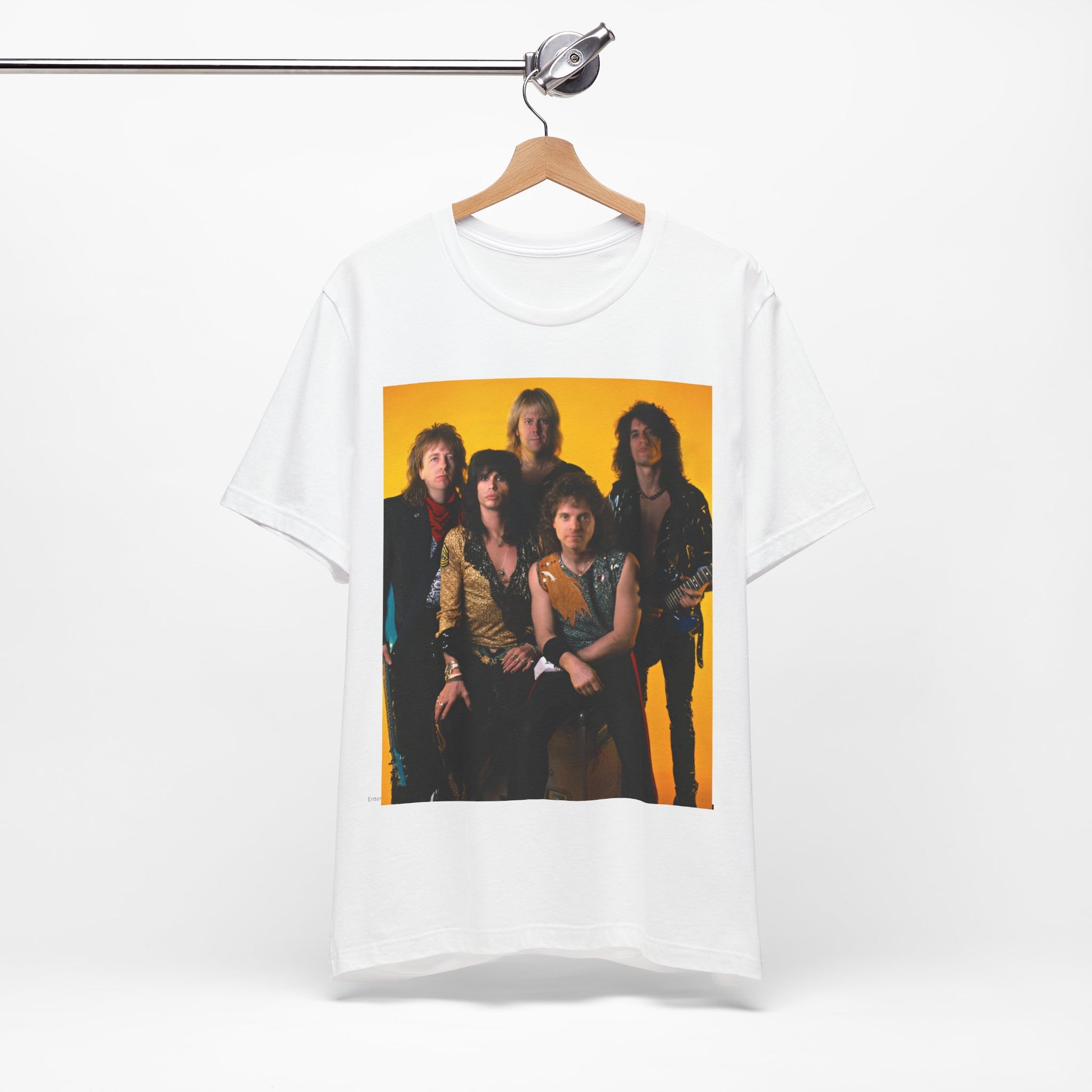 A black graphic t-shirt featuring a band photo of Aerosmith from the 1980s, showing the members in their iconic styles from that decade.