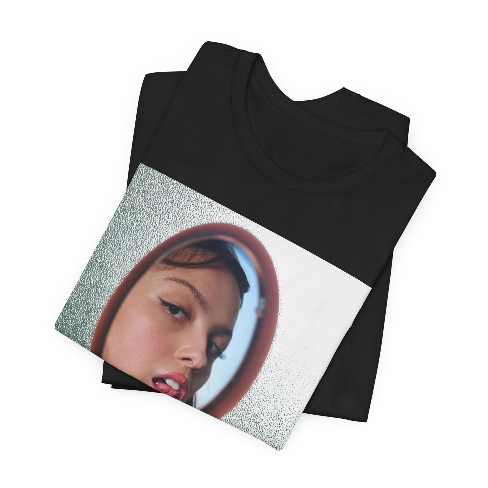 A black graphic t-shirt featuring a Y2K pop aesthetic graphic of Olivia Rodrigo.
