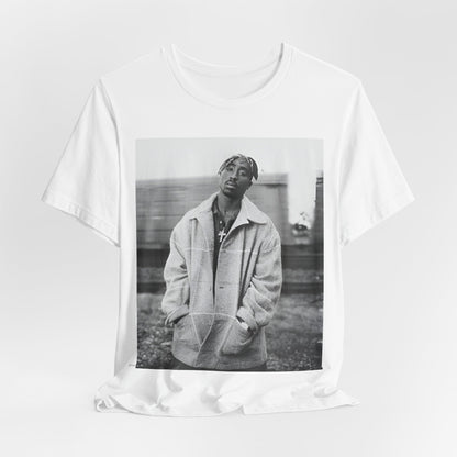 A black graphic t-shirt featuring a graphic related to Tupac's 'Thug Life' philosophy.