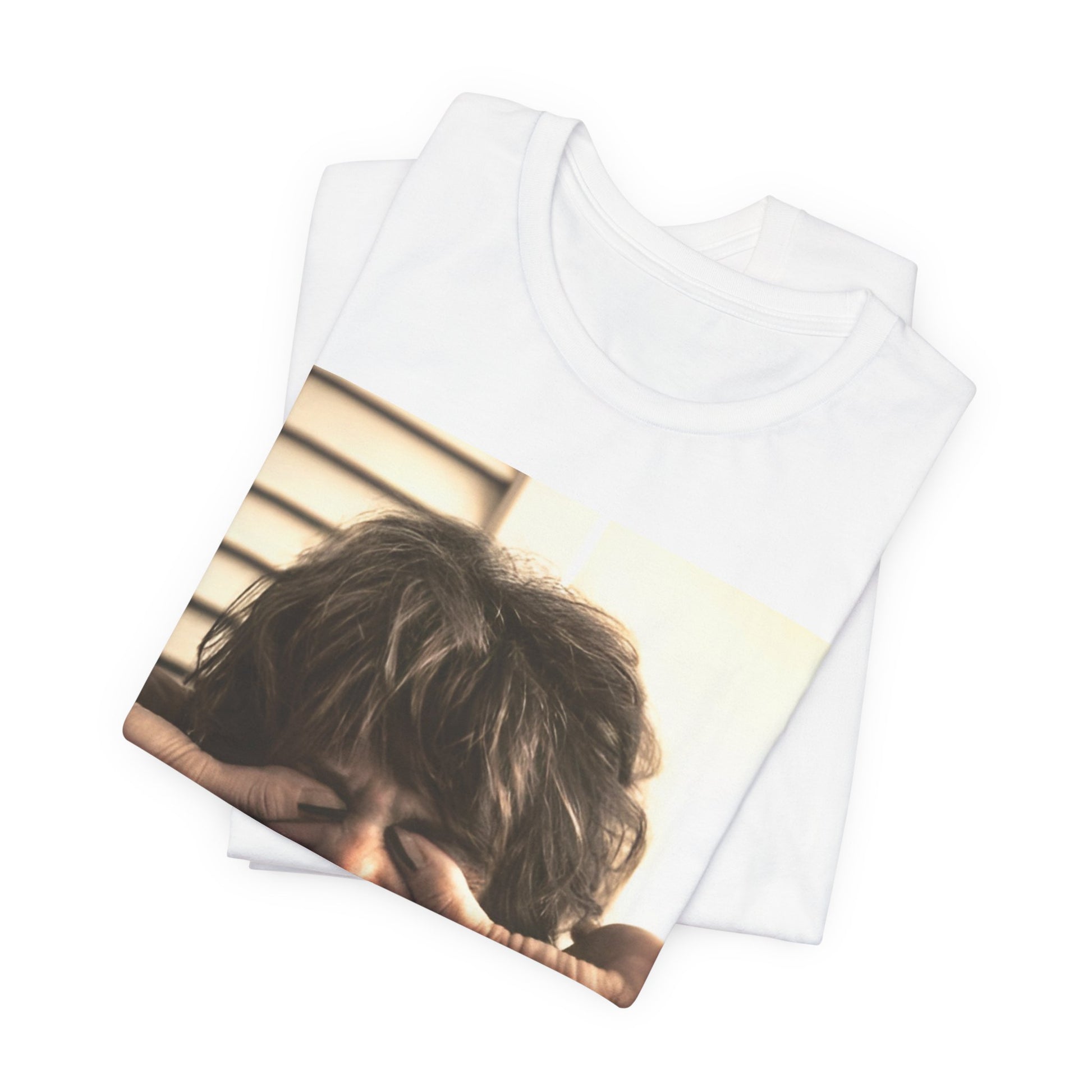 A black graphic t-shirt featuring a vintage 70s band photo of Aerosmith, showing the members in their iconic early looks.