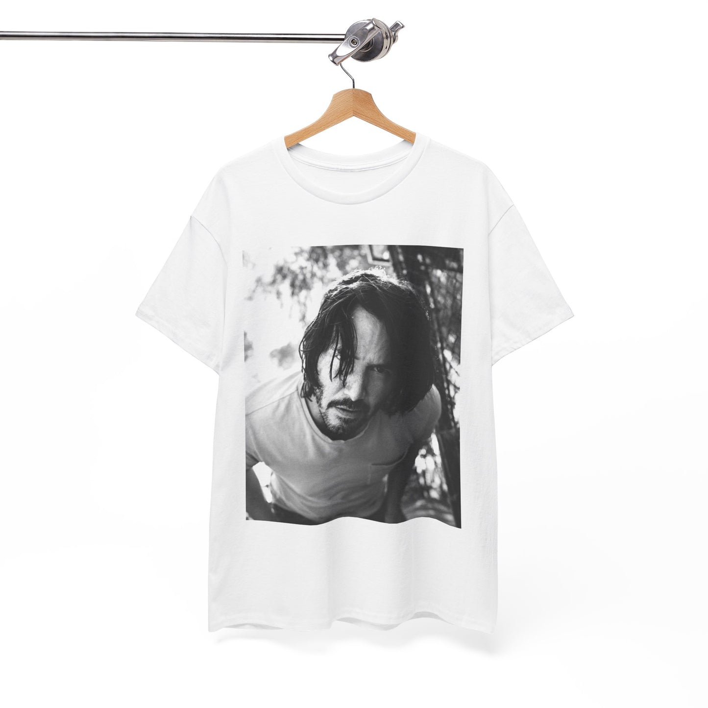 A black graphic t-shirt featuring a graphic of Keanu Reeves with authentic chill vibes.