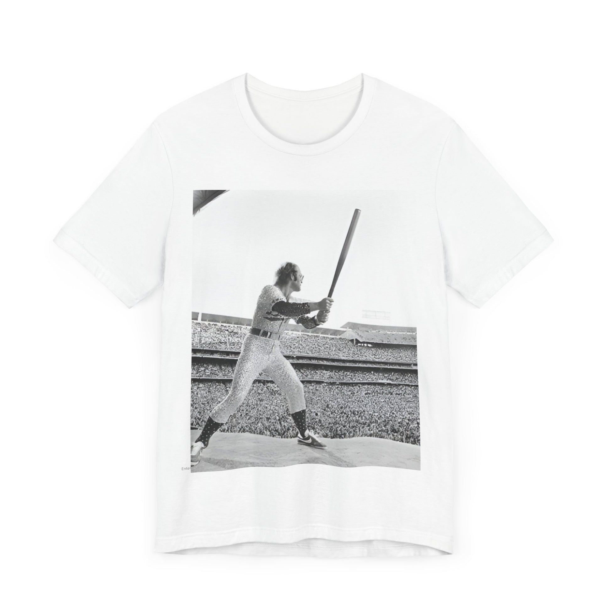 A black graphic t-shirt featuring a black and white graphic or photo related to Elton John's 1975 tour in America.