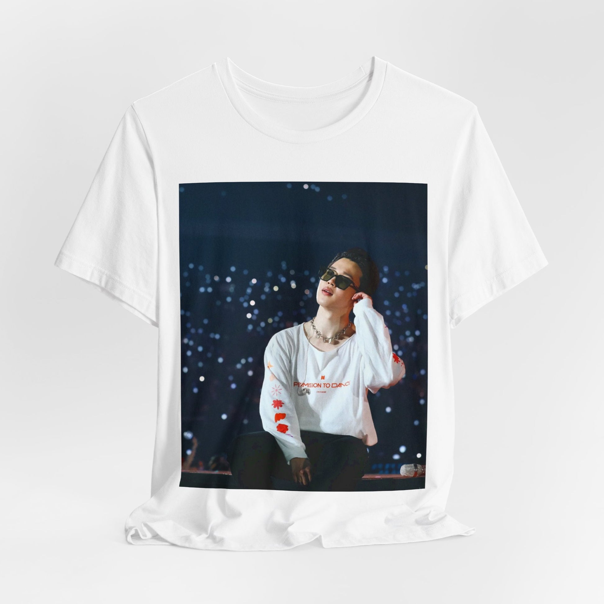 A black graphic t-shirt featuring a vintage aesthetic graphic related to Jimin's 'Lie' era.