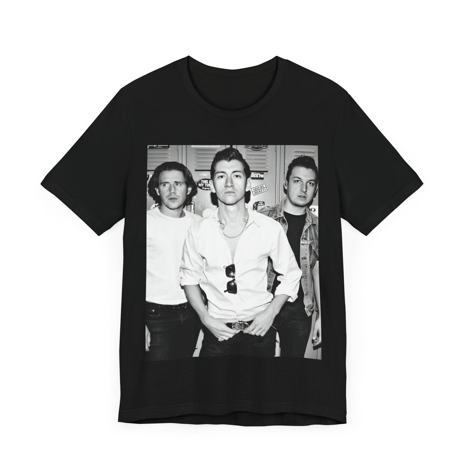 A black graphic t-shirt featuring a vintage-style design related to Arctic Monkeys' 'AM' album era, possibly with the album art or band imagery.
