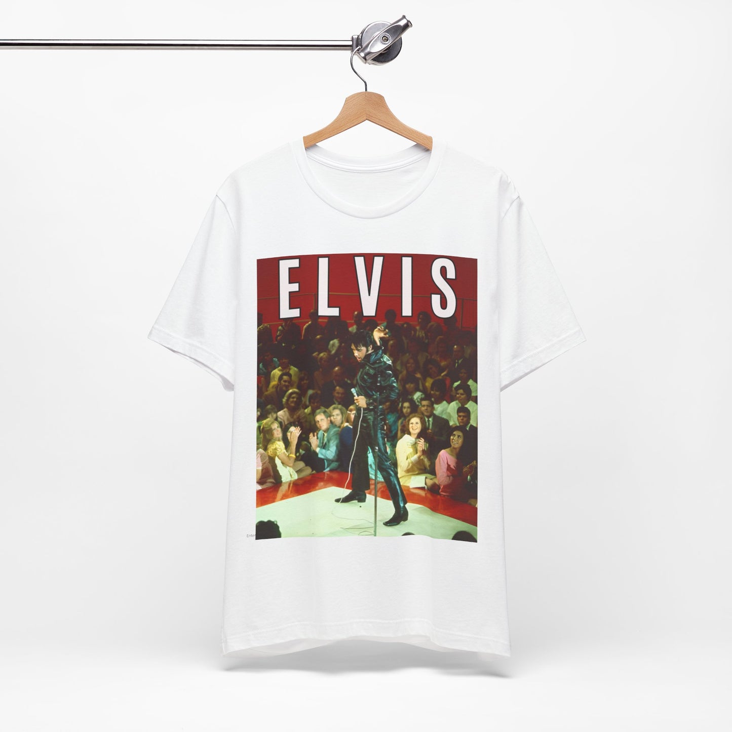 A black graphic t-shirt featuring a retro graphic related to an Elvis Presley special concert.