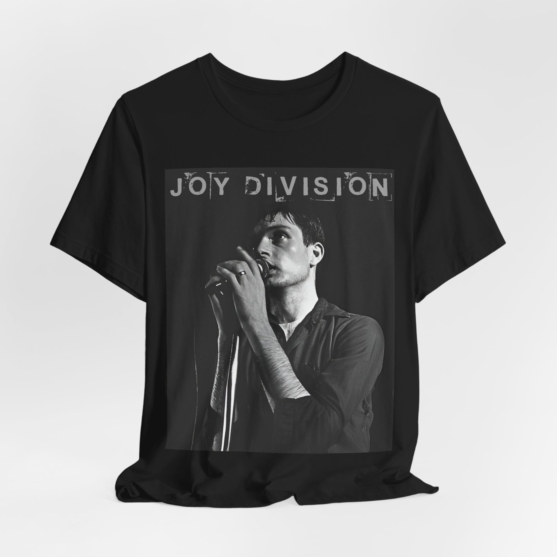 A black graphic t-shirt featuring an 80s goth rock aesthetic graphic of Joy Division.
