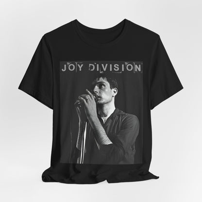 A black graphic t-shirt featuring an 80s goth rock aesthetic graphic of Joy Division.