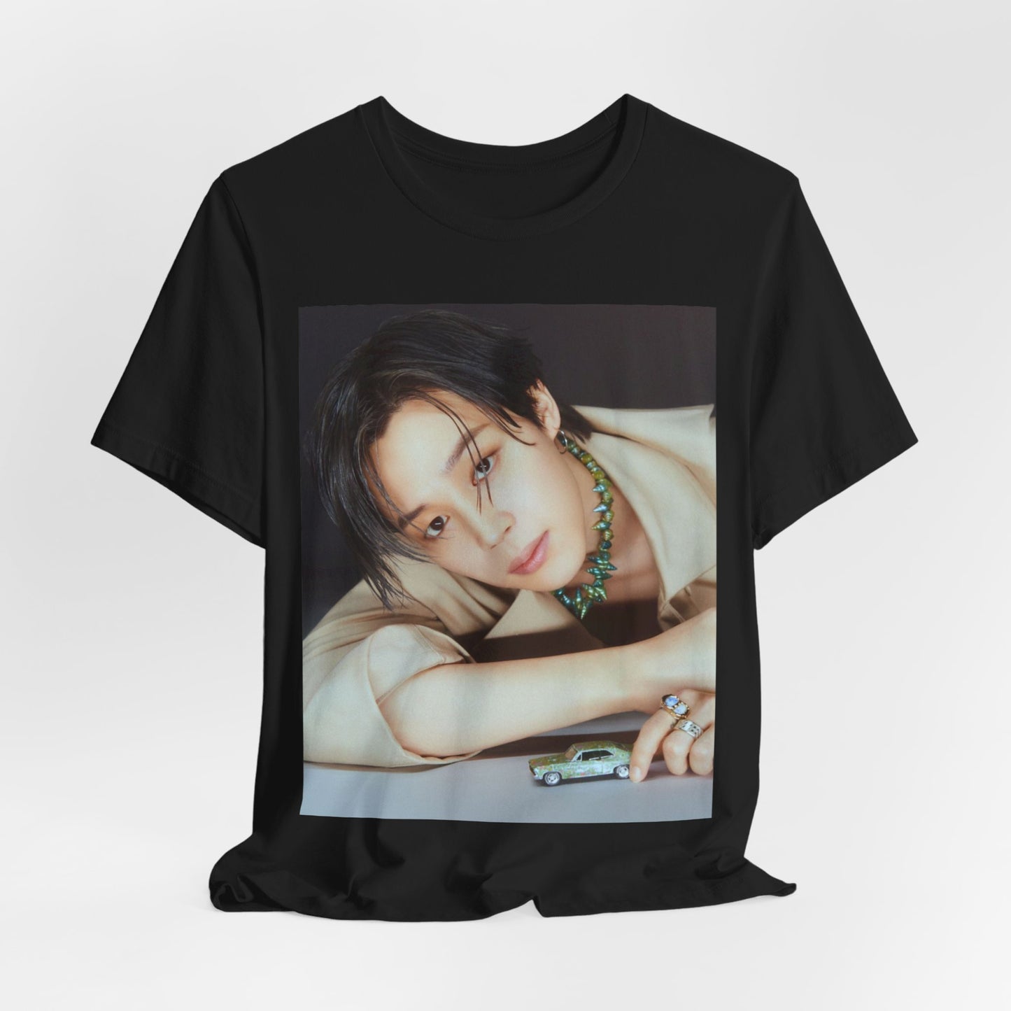 A black graphic t-shirt featuring a retro graphic related to Jimin's 'Filter' era.
