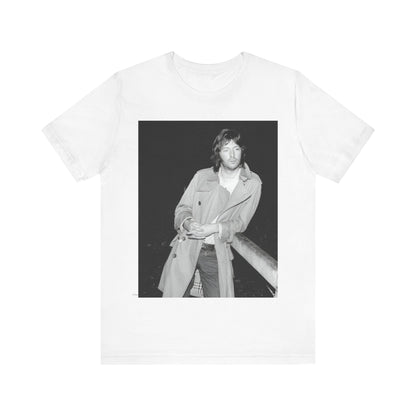 A black graphic t-shirt featuring a retro graphic of Eric Clapton as a blues master.