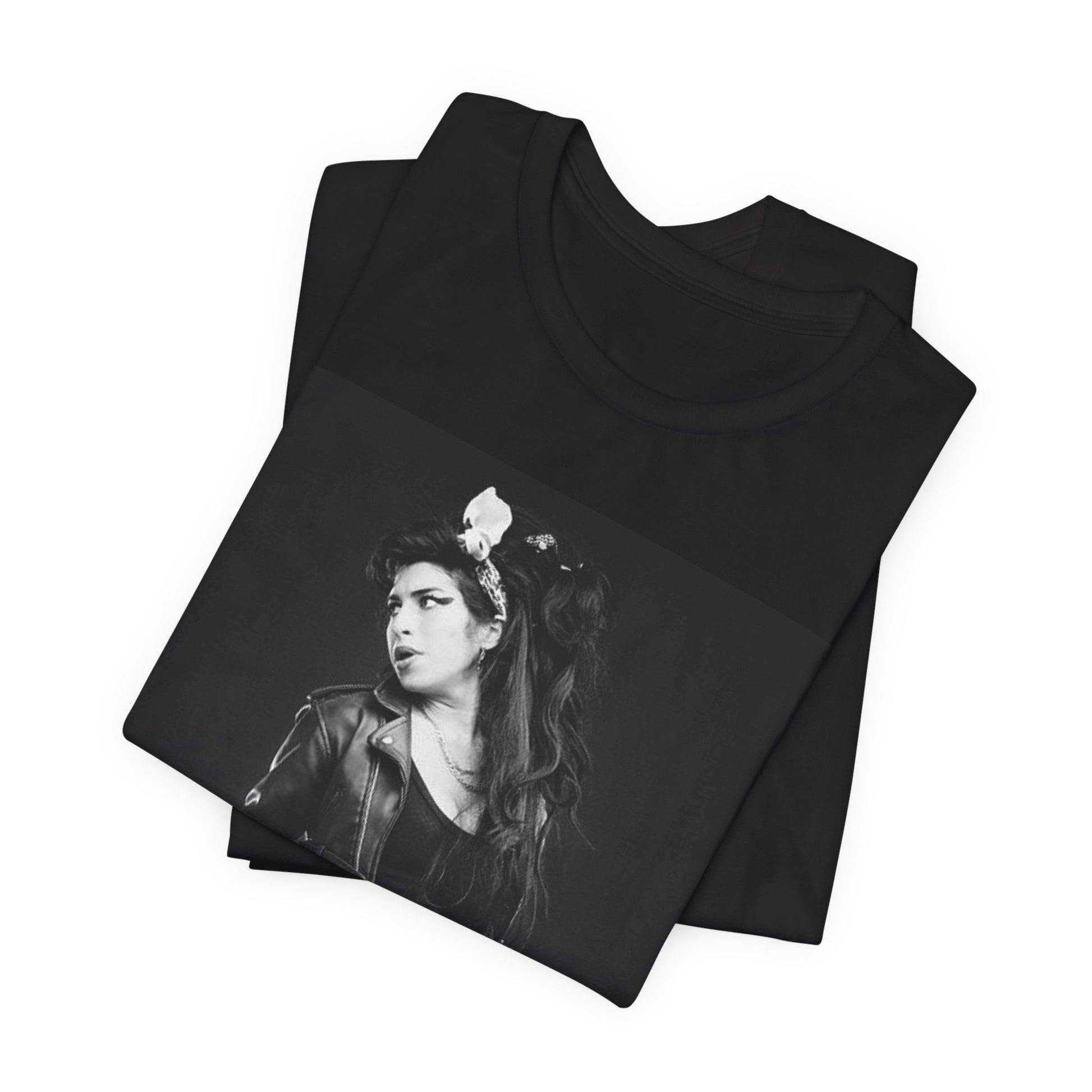 A black graphic t-shirt featuring a graphic related to Amy Winehouse's 'Frank' album era from 2003, possibly with early portrait imagery.