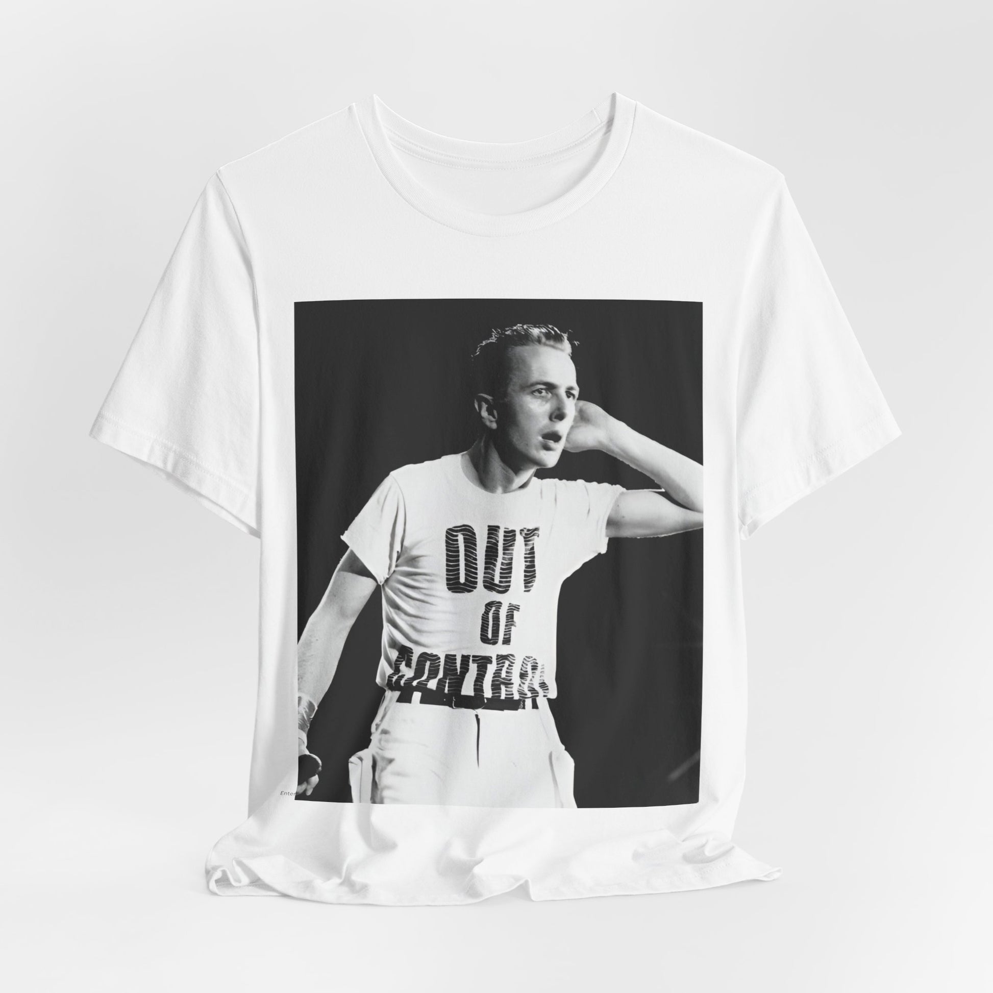A black graphic t-shirt featuring a black and white graphic or photo portrait of Joe Strummer from The Clash.