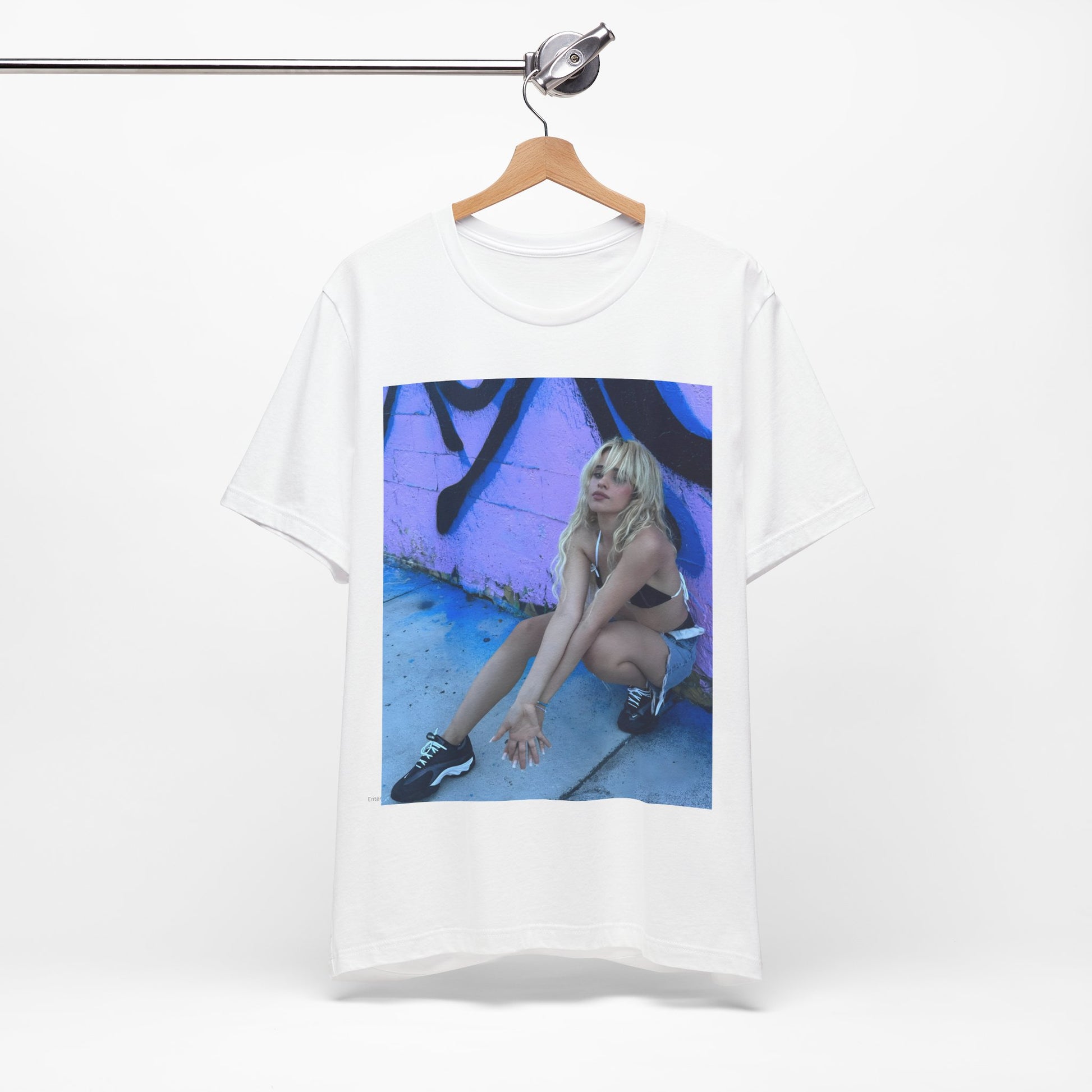 A black graphic t-shirt featuring a photo of Camila Cabello from her "Romance" album era.
