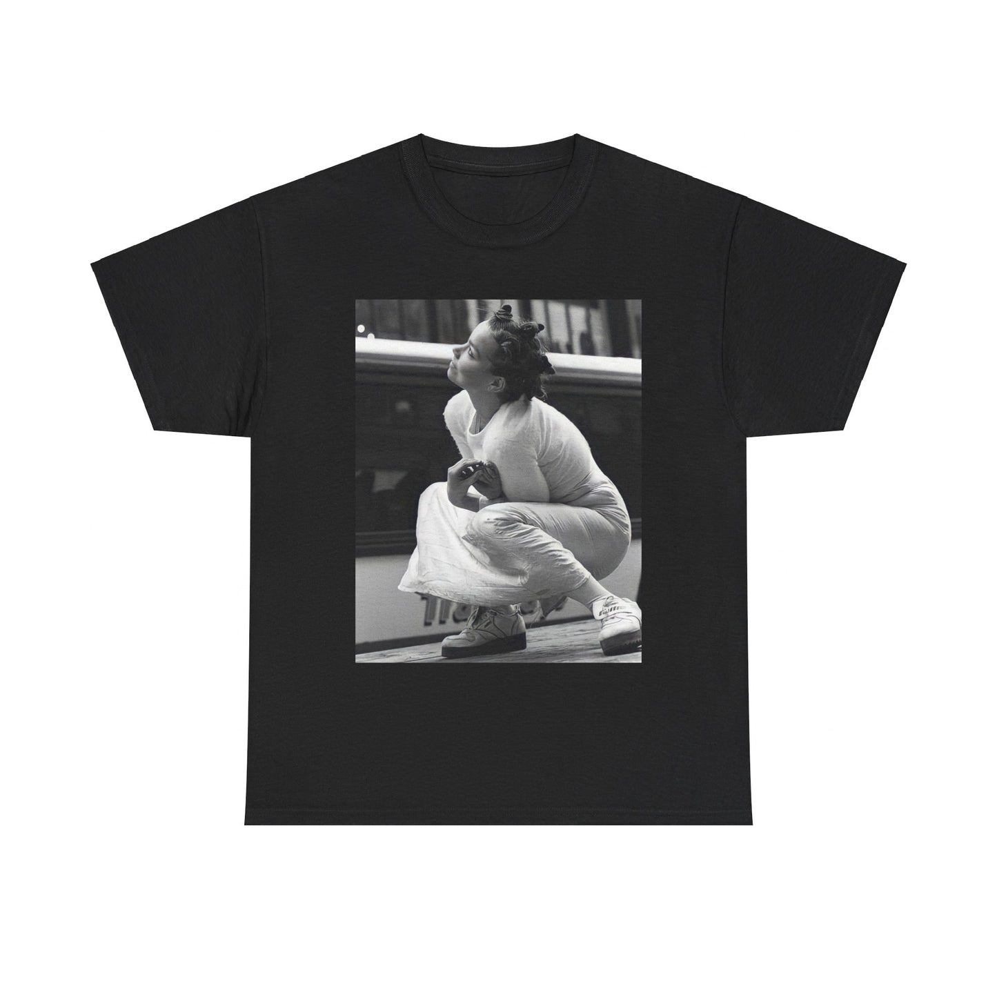 A black graphic t-shirt featuring a graphic of Bjork as an experimental pop icon.