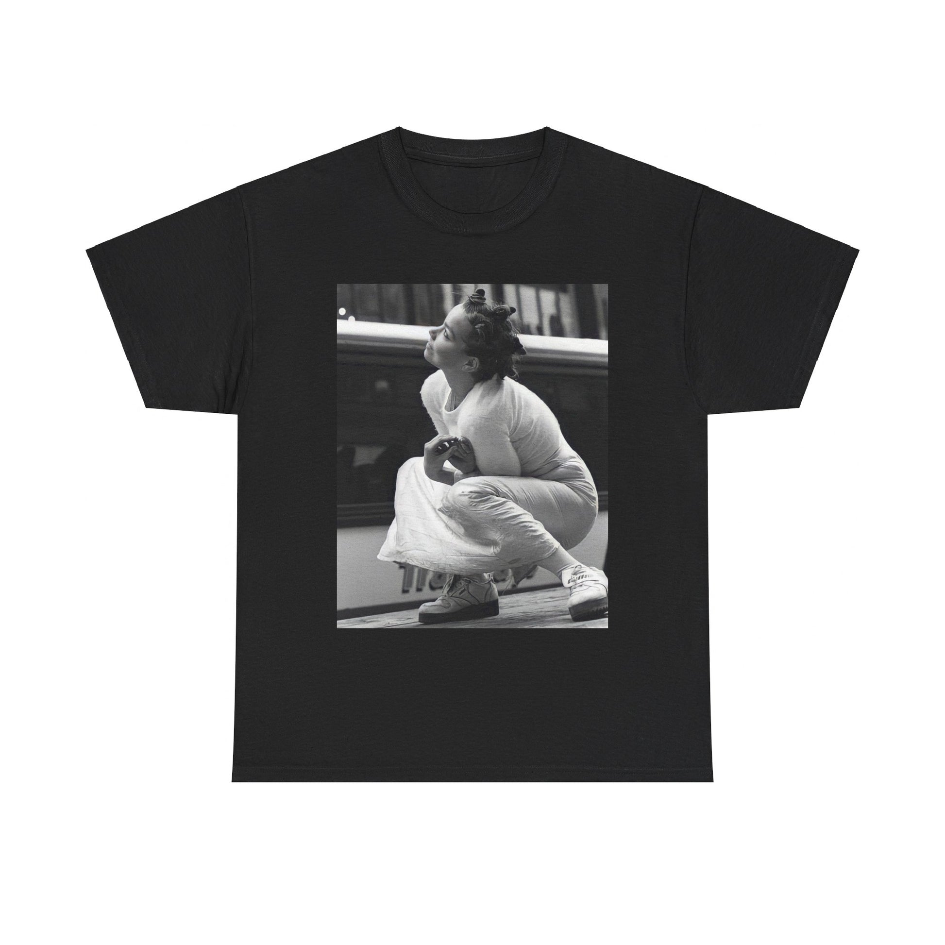 A black graphic t-shirt featuring a graphic of Bjork as an experimental pop icon.