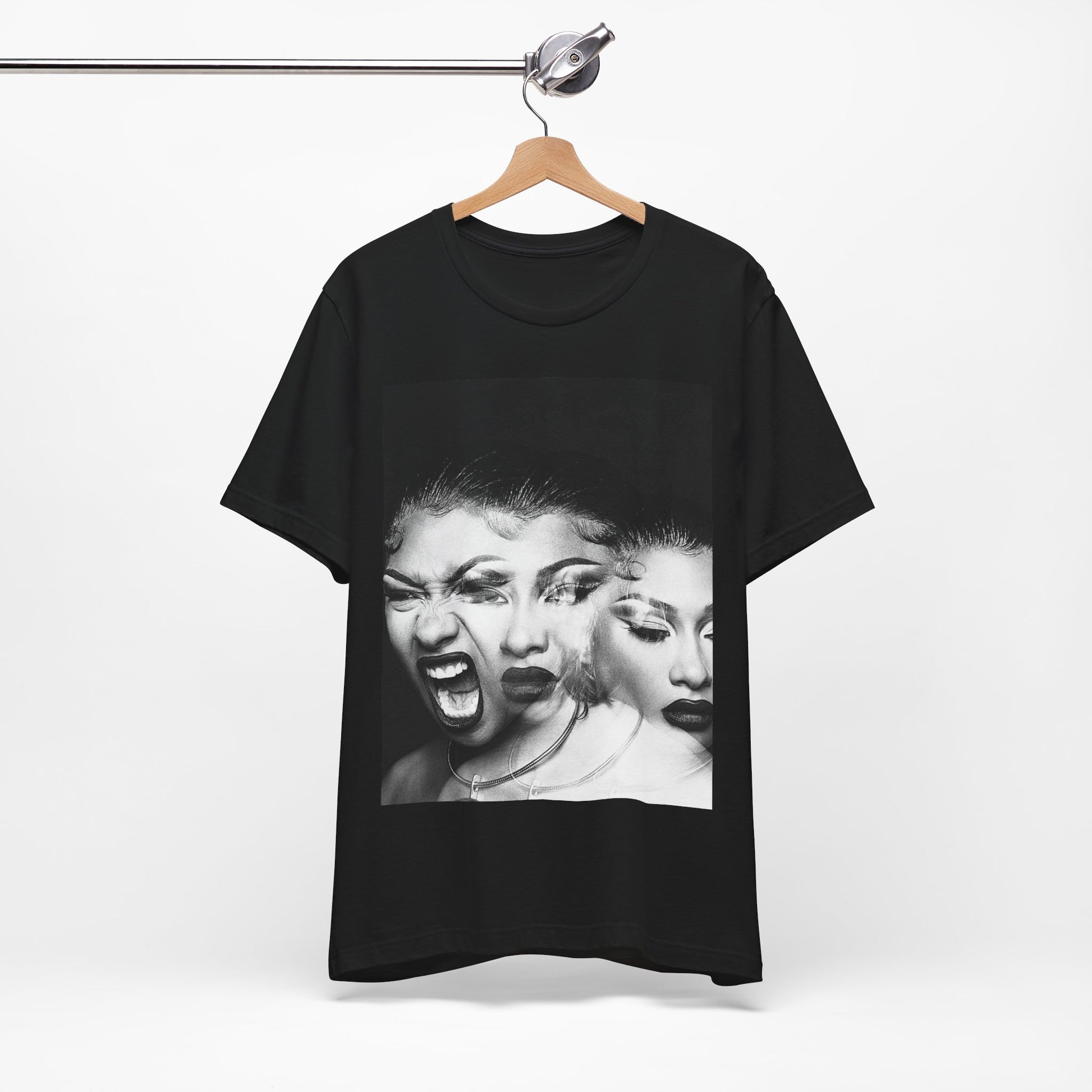 A black graphic t-shirt featuring a graphic related to Megan Thee Stallion's 'Traumazine' album.