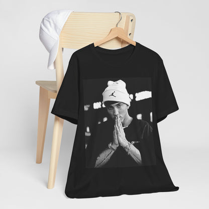 A black graphic t-shirt featuring a black and white portrait photo of Eminem.