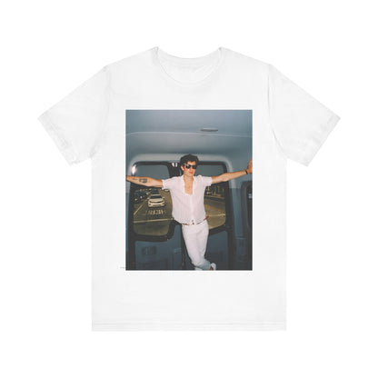A black graphic t-shirt featuring a graphic of Shawn Mendes with a classic confident look.