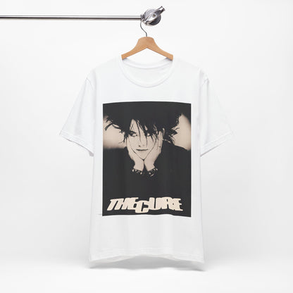 A black graphic t-shirt featuring a graphic of The Cure with cool new wave vibes.