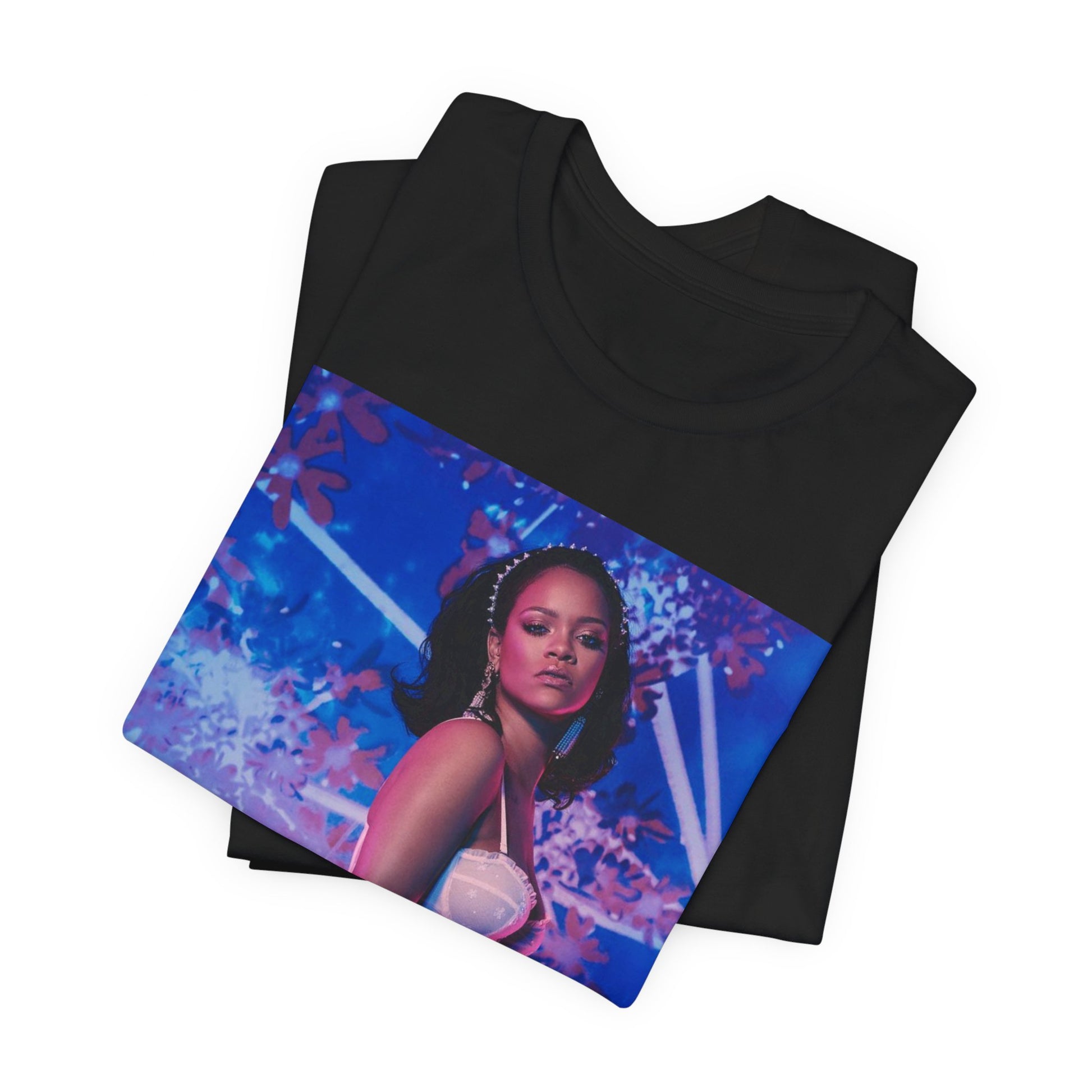 A black graphic t-shirt featuring a graphic of Rihanna as a lingerie goddess.