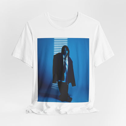 A high-fashion, editorial-style photo of Billie Eilish, embodying a 'breaking the rules' attitude, printed on a graphic t-shirt.