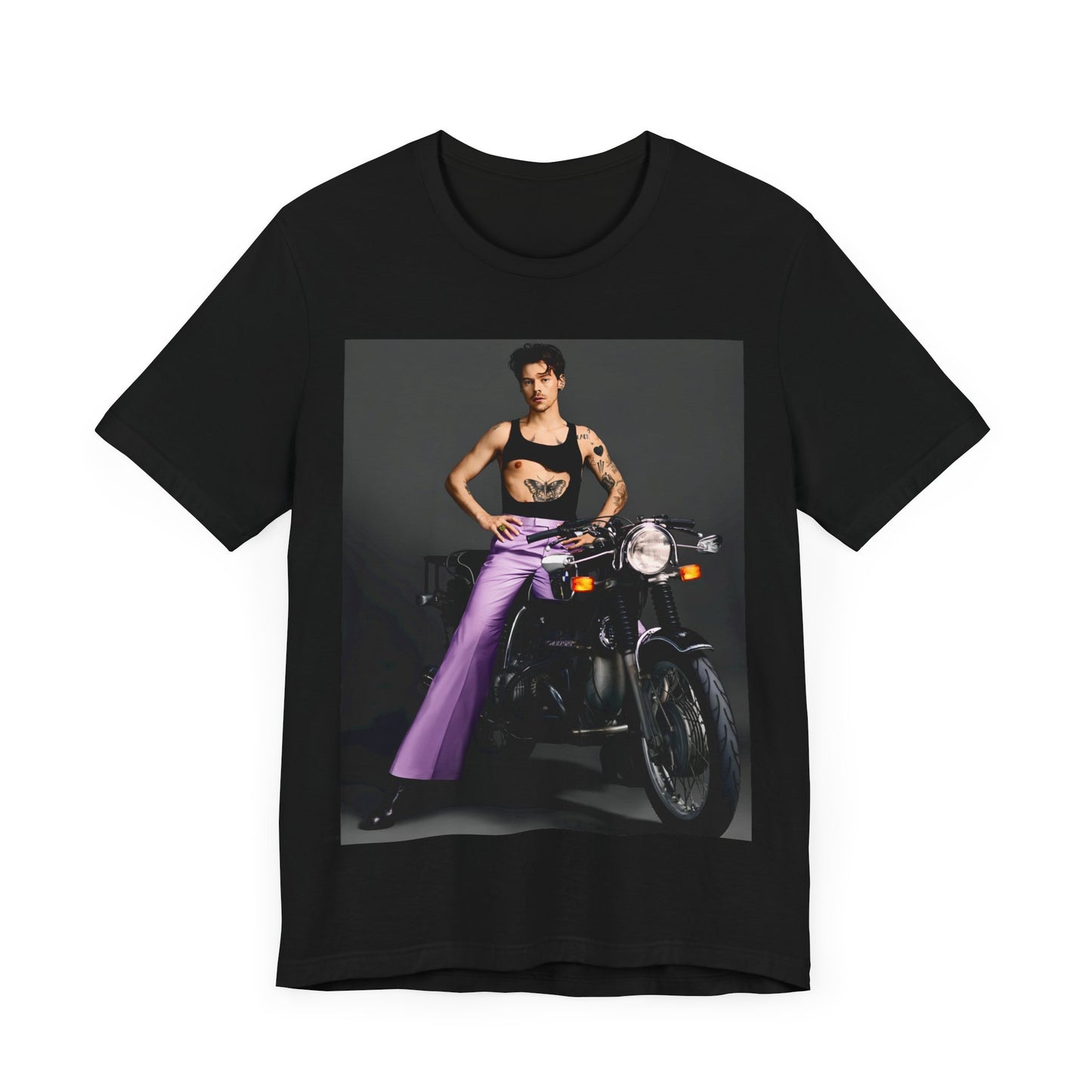 A black graphic t-shirt featuring a graphic of Harry Styles related to motorcycles or a rebellious, cool style.