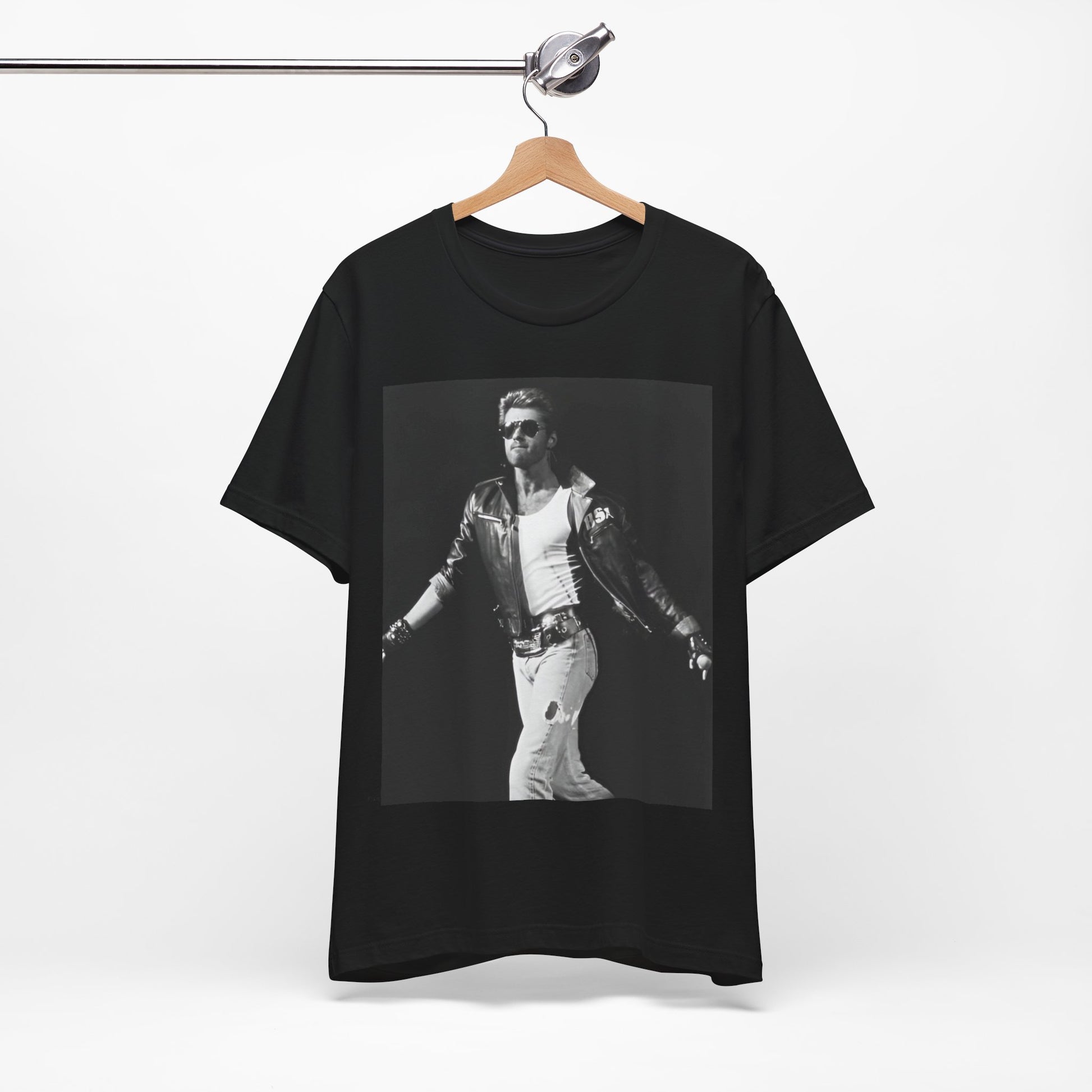 A black graphic t-shirt featuring a retro black and white monochrome graphic or photo of George Michael.