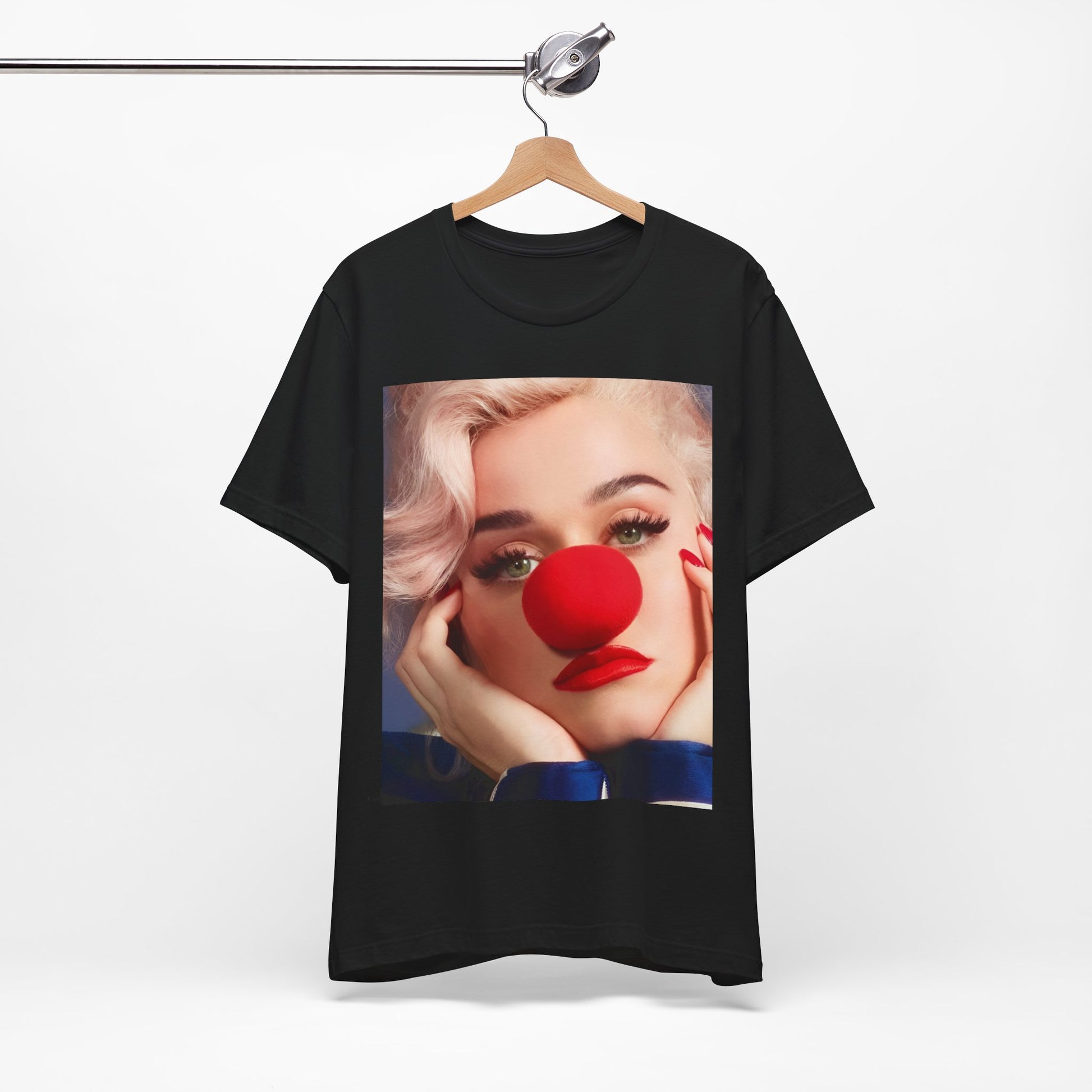 A black graphic t-shirt featuring a graphic related to Katy Perry's 'Smile' album.
