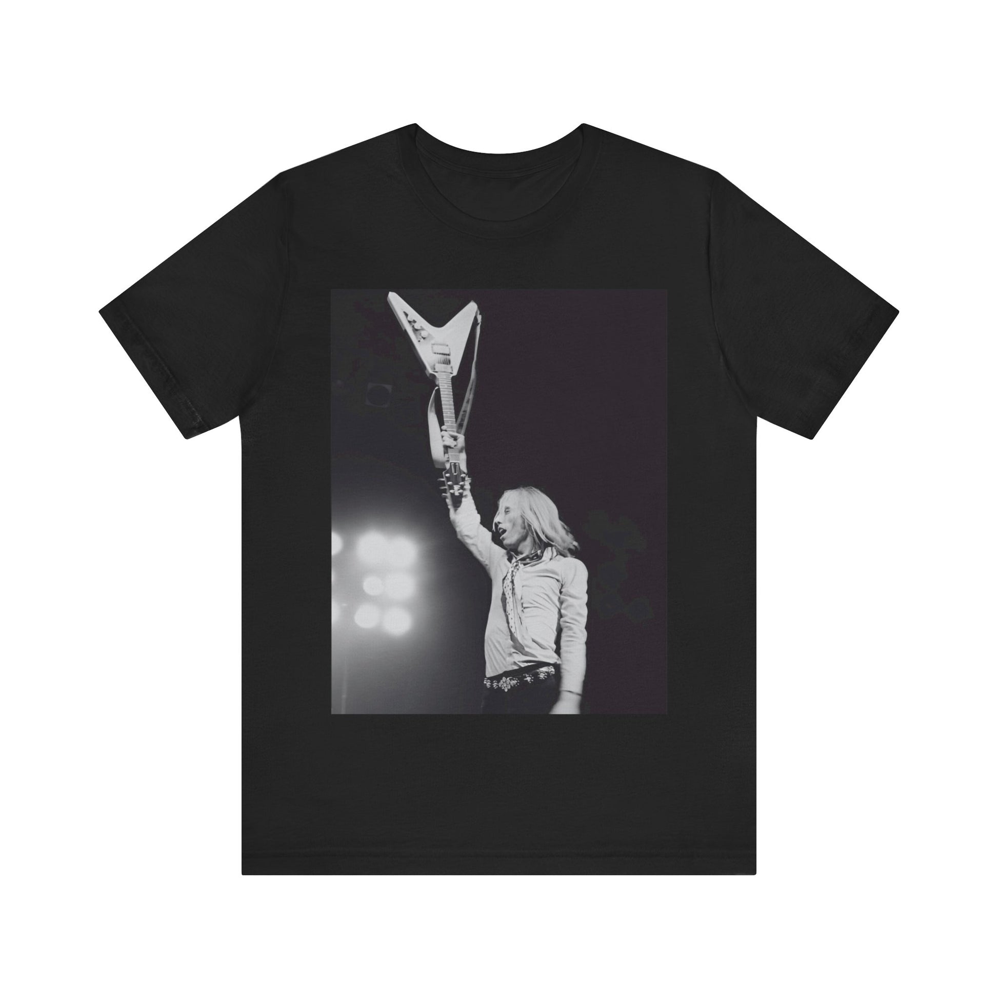 A black graphic t-shirt featuring a graphic or photo of Tom Petty playing guitar on stage.