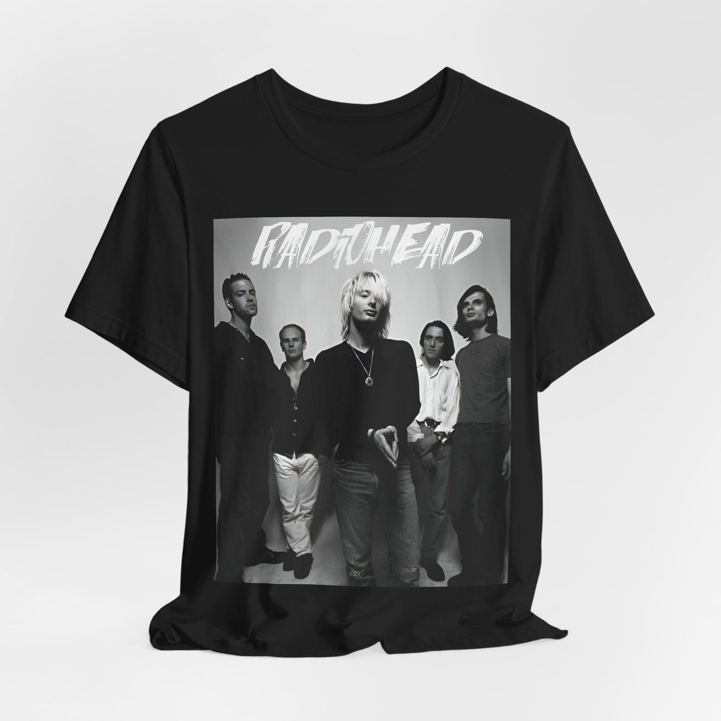 A black graphic t-shirt featuring a retro graphic related to Radiohead's 'OK Computer' album era.