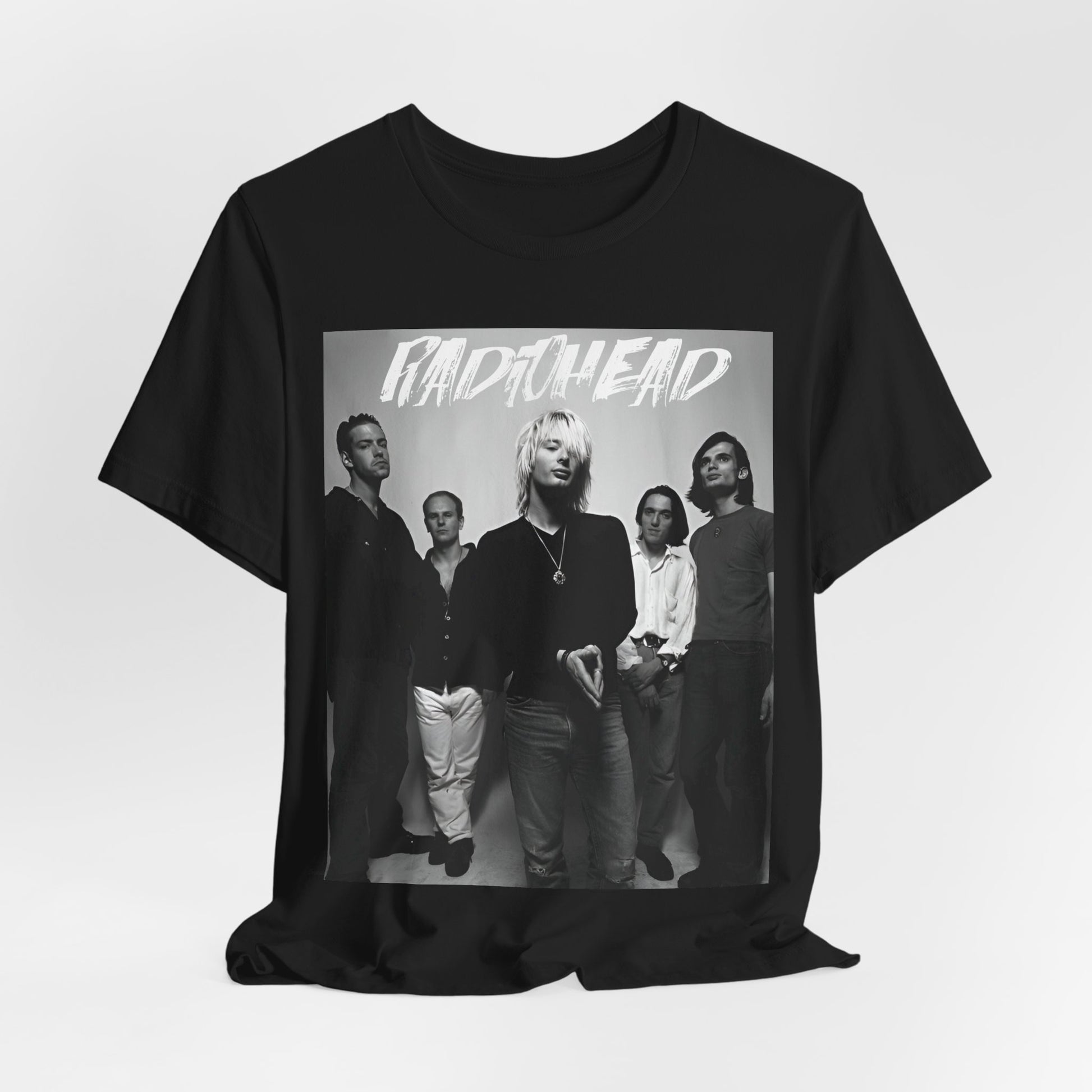 A black graphic t-shirt featuring a retro graphic related to Radiohead's 'OK Computer' album era.