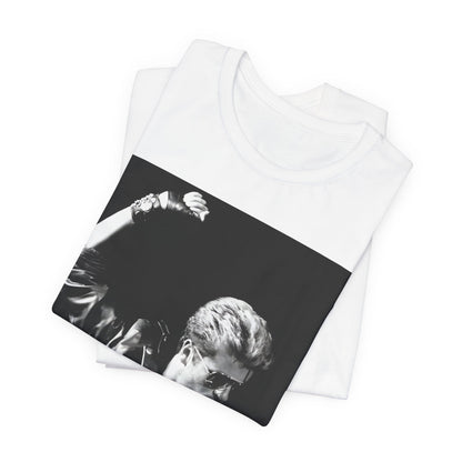 A black graphic t-shirt featuring a black and white photo of George Michael from his 'Faith' album era.