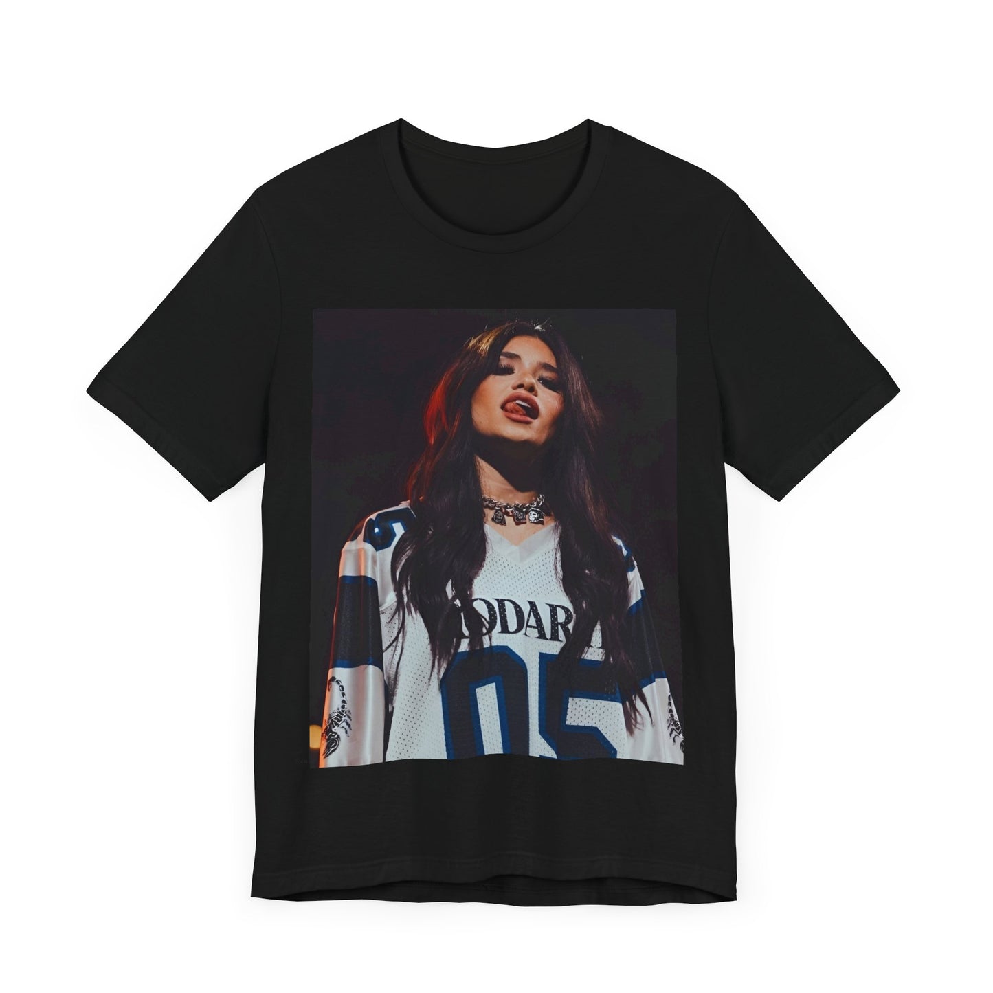 A black graphic t-shirt featuring a graphic or photo of Nessa Barrett performing live.