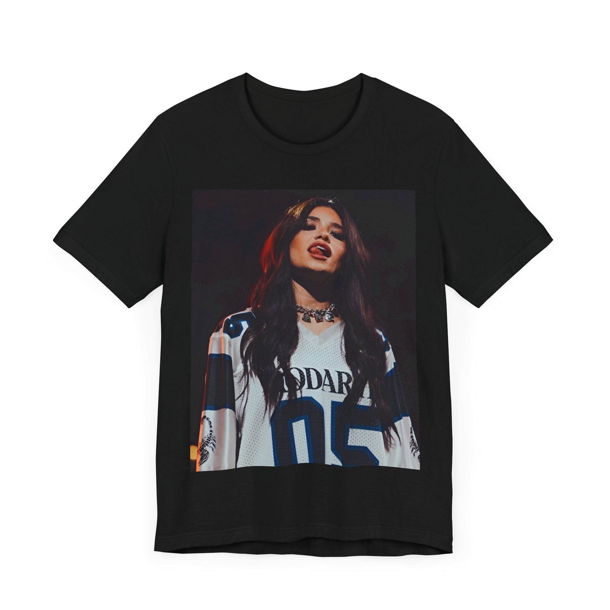 A black graphic t-shirt featuring a graphic or photo of Nessa Barrett performing live.