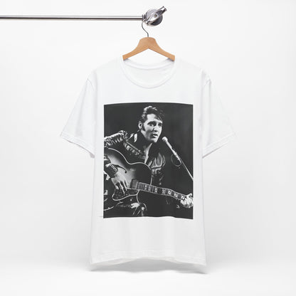 A black graphic t-shirt featuring a graphic related to Elvis Presley's 'Burning Love' song or era.