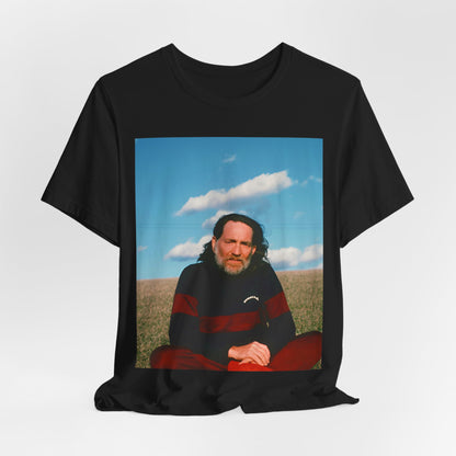 A black graphic t-shirt featuring a classic outlaw country graphic of Willie Nelson.