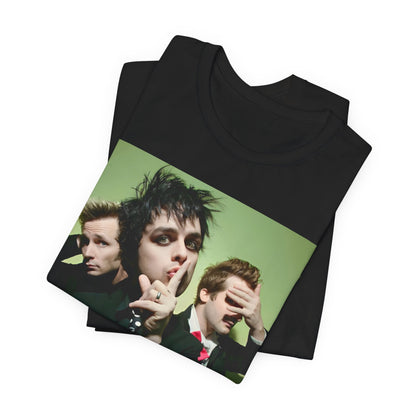 A black graphic t-shirt featuring a classic 90s pop-punk aesthetic graphic of Green Day.