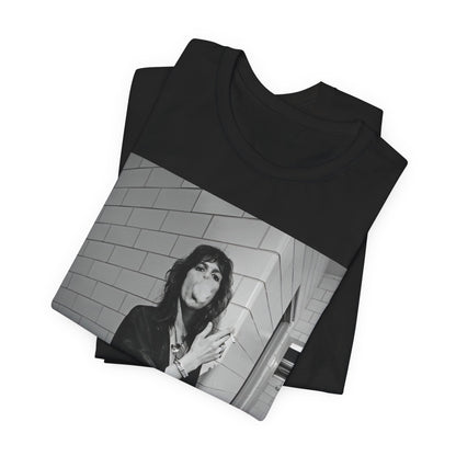 A black graphic t-shirt featuring a retro 70s photo of Aerosmith band members in a backstage setting, showing a candid moment.