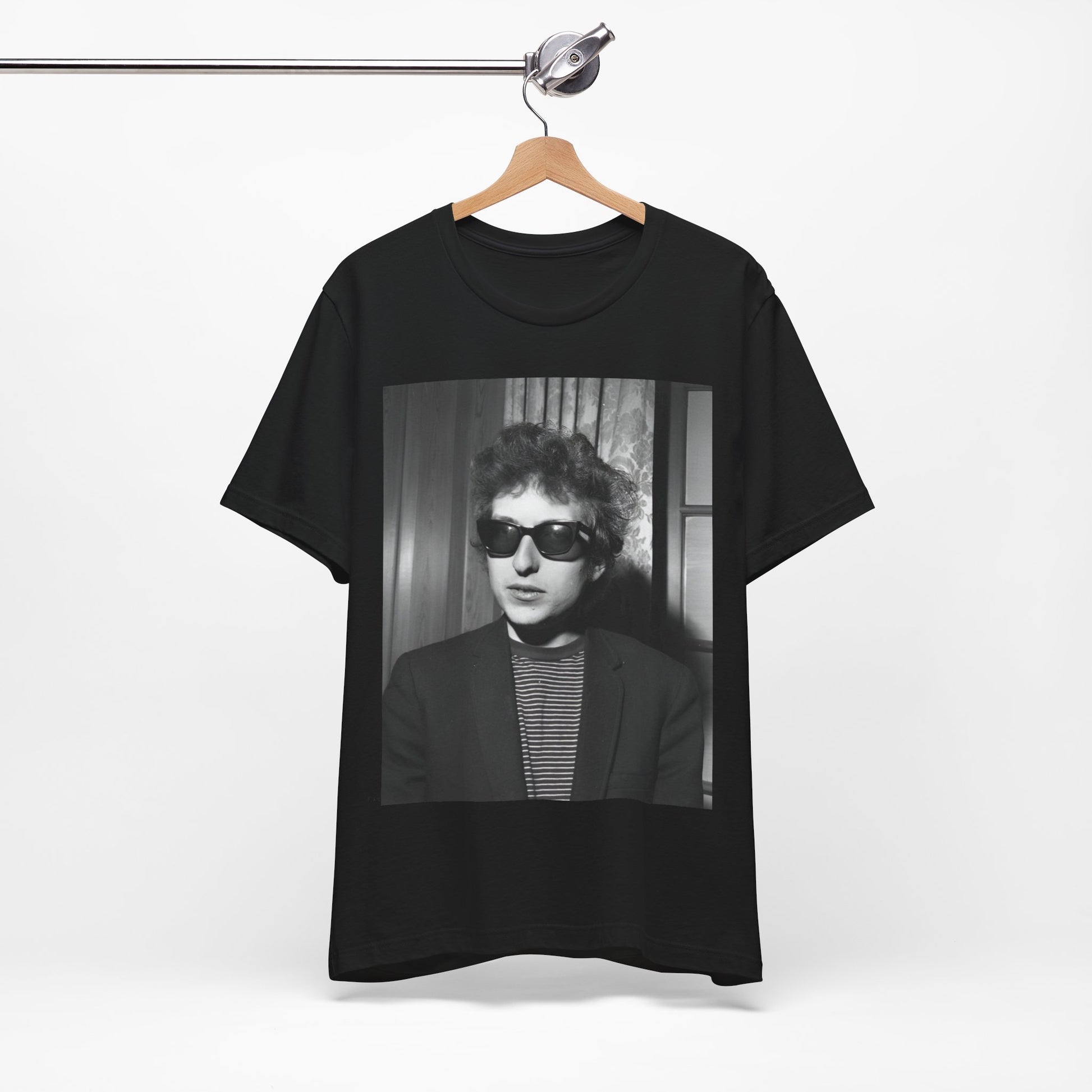 A black graphic t-shirt featuring a graphic related to Bob Dylan's 'The Freewheelin' album era.