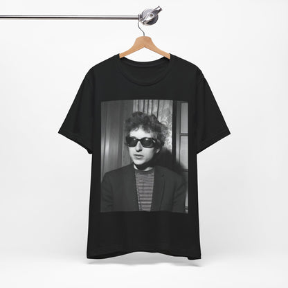 A black graphic t-shirt featuring a graphic related to Bob Dylan's 'The Freewheelin' album era.