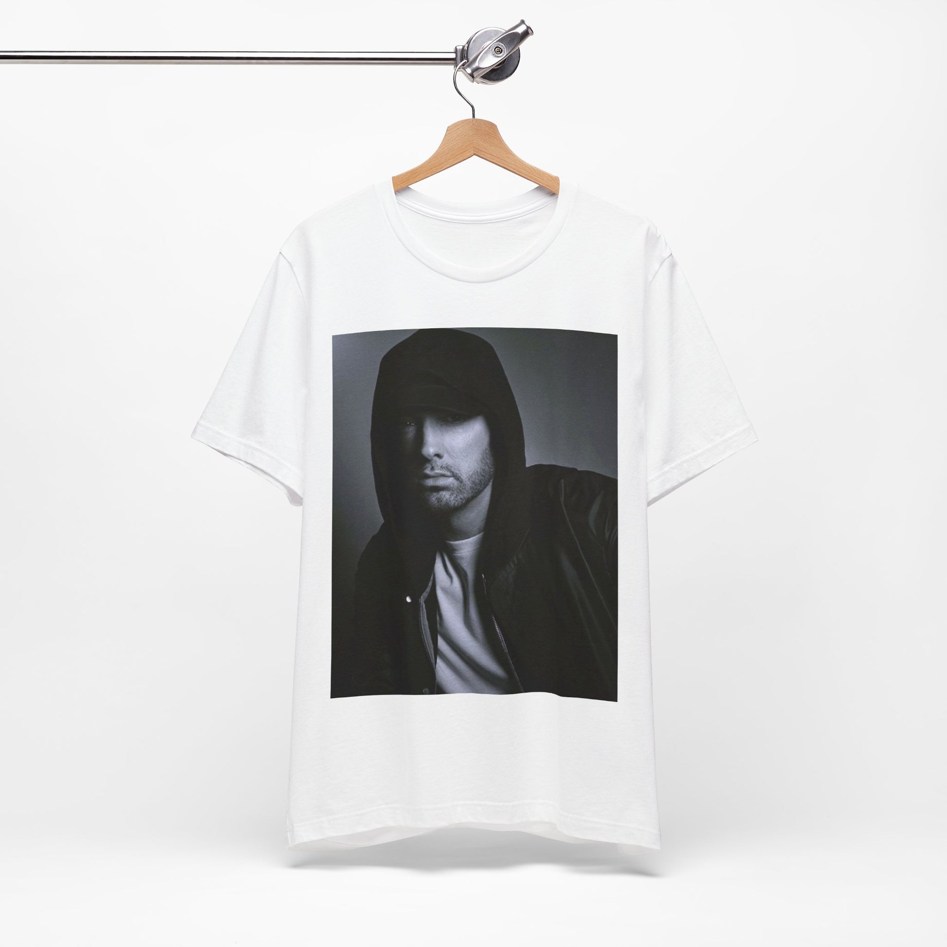 A black graphic t-shirt featuring a black and white, monochrome graphic or photo of Eminem.