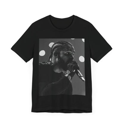 A black graphic t-shirt featuring a classic black and white style graphic of Drake.
