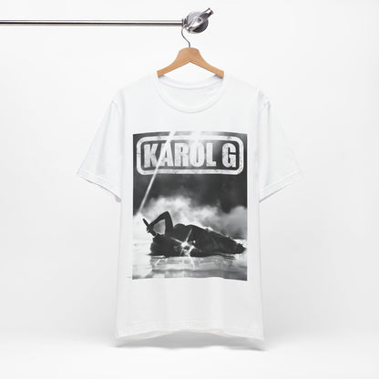 A black graphic t-shirt featuring a black and white graphic or photo of Karol G performing live on stage.